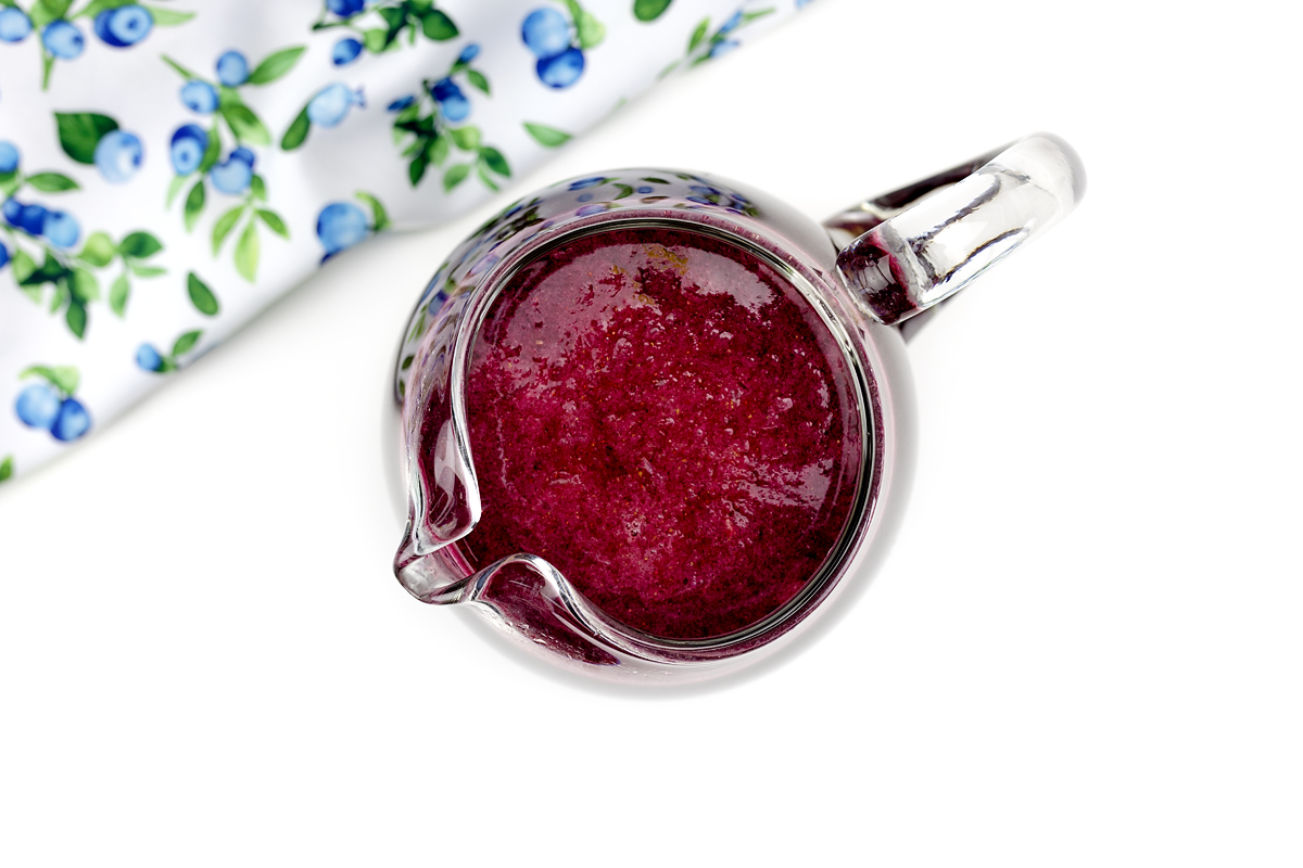 Finished blueberry lemonade in a pitcher.