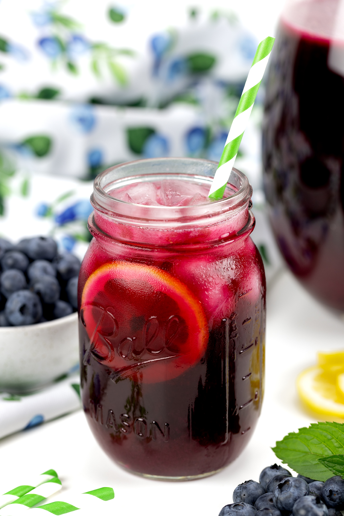 Refreshing blueberry lemonade in a mason jar.