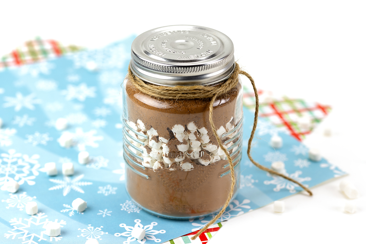 Hot chocolate mix layered with marshmallows in a jar.