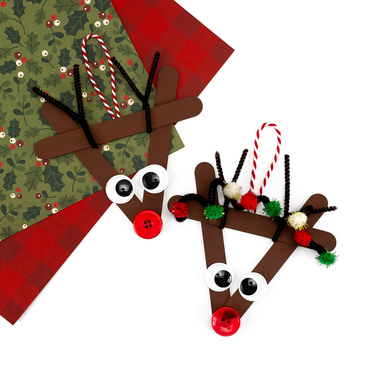 Two finished Popsicle Stick Reindeer crafts for kids. 