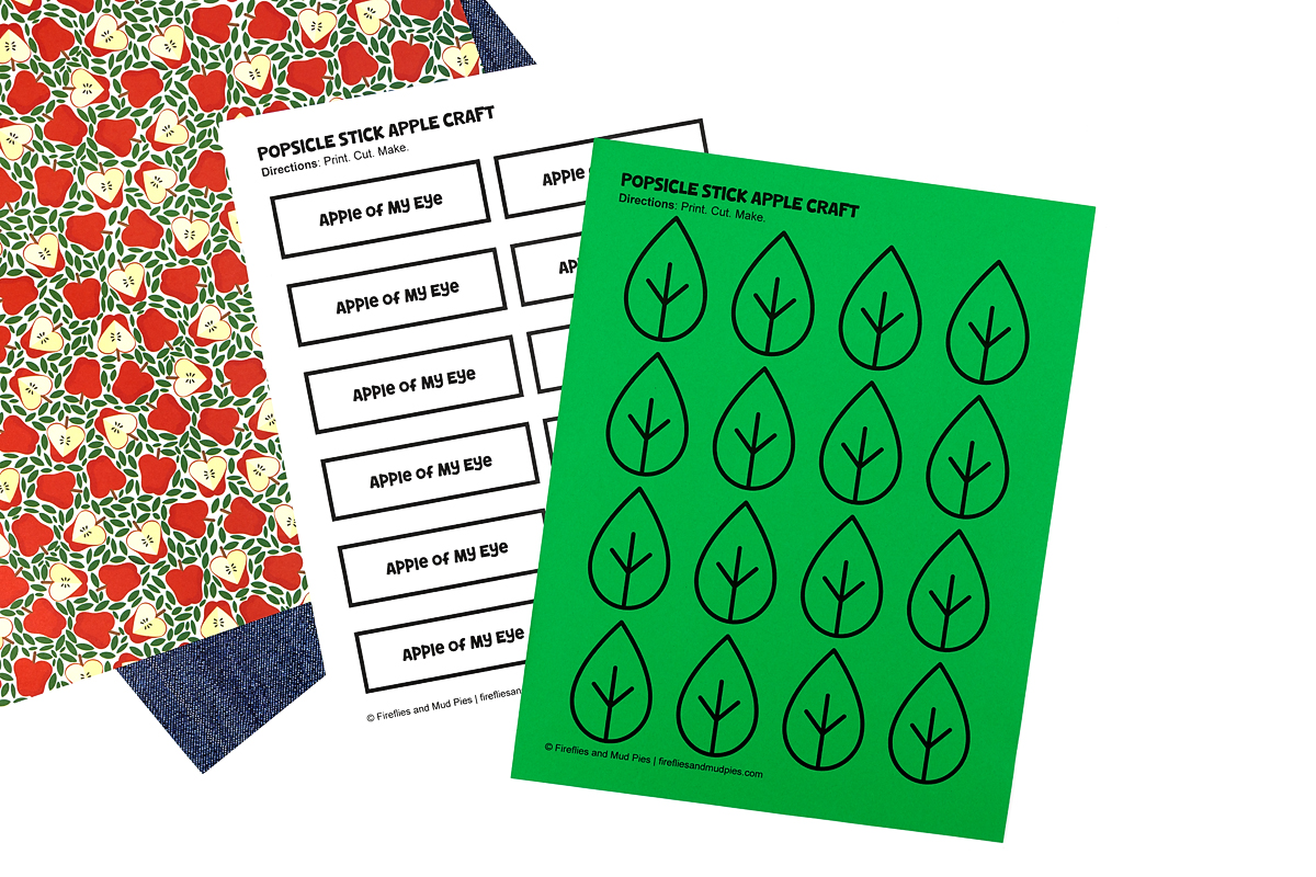 Free printable template for the popsicle stick apple craft, showing Apple of My Eye labels and a leaf pattern to trace onto green felt or paper.