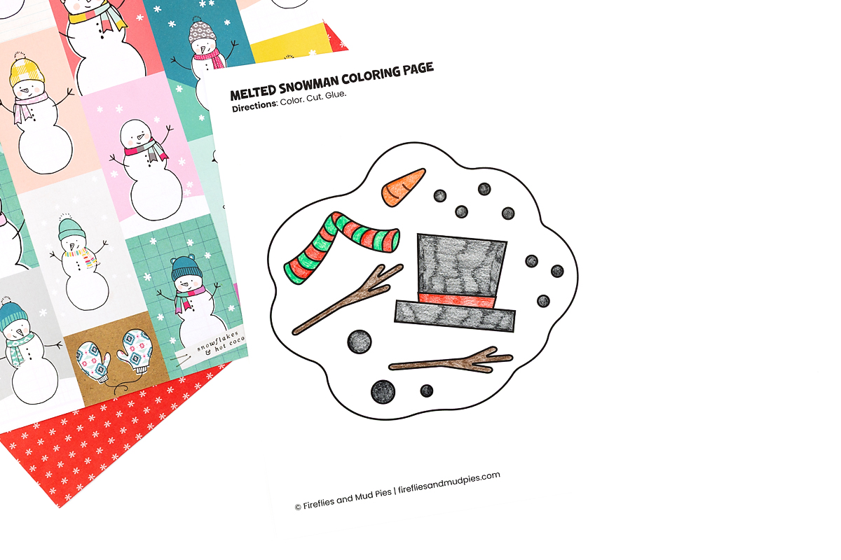 Hand Coloring Melted Snowman Scarf Melted Snowman template colored with bright pencils on a flat surface.