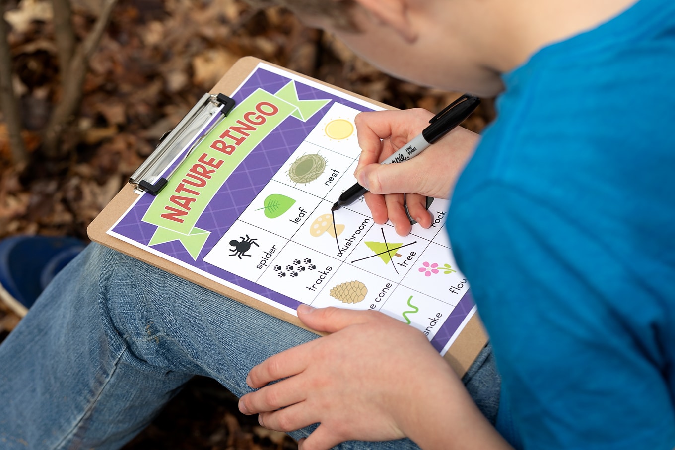 Child Playing Nature Scavenger Hunt