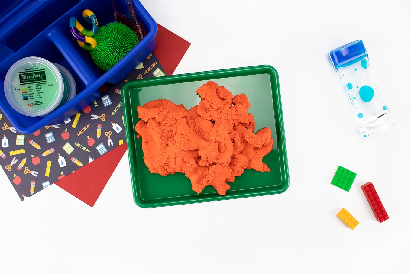 Orange Sensory Material on a Green Tray