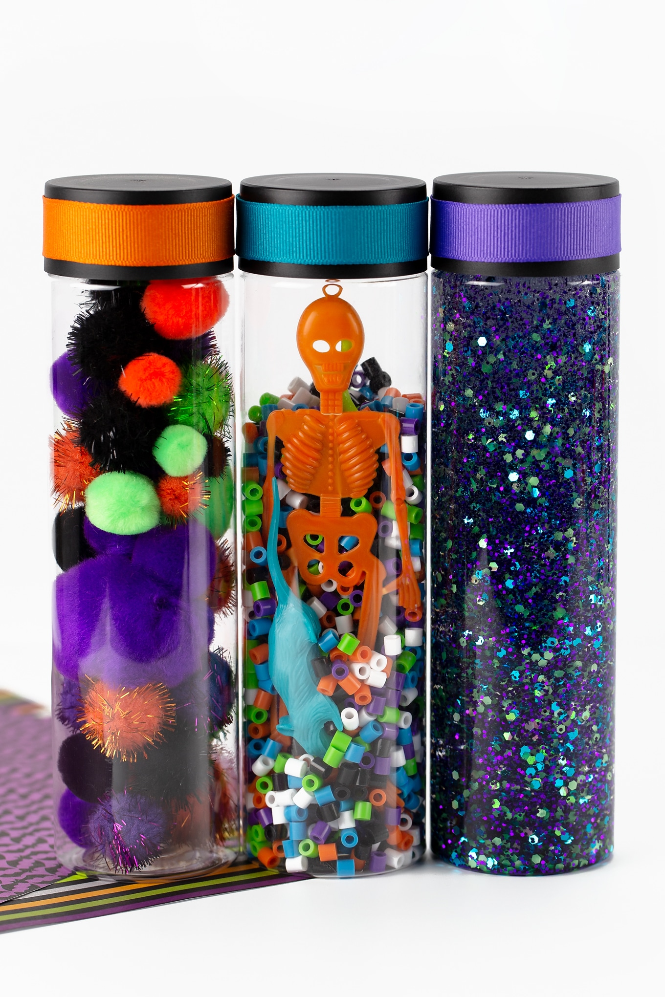 Halloween Sensory Bottles Fireflies and Mud Pies