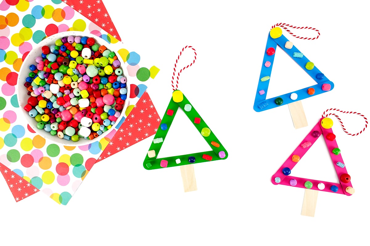 Popsicle Stick Christmas Tree Ornament Craft for Kids Finished popsicle stick Christmas tree ornament.