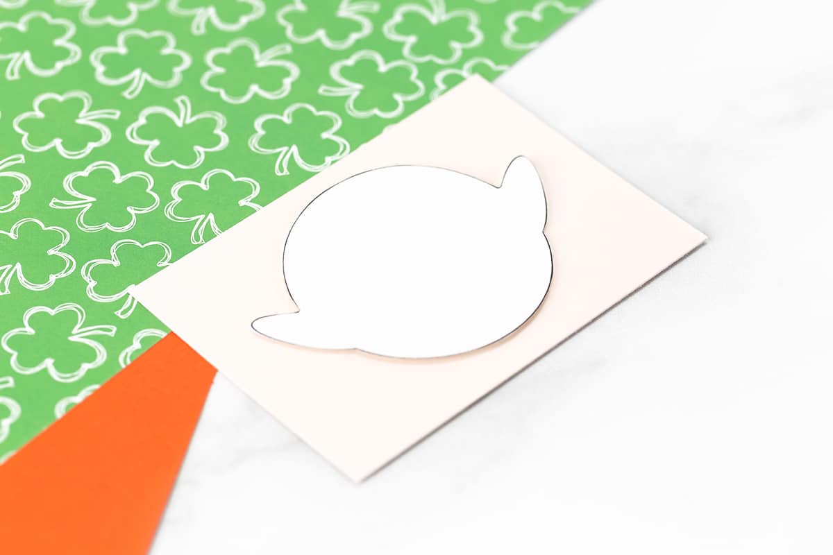 Demonstration of how to trace the pattern onto card stock.