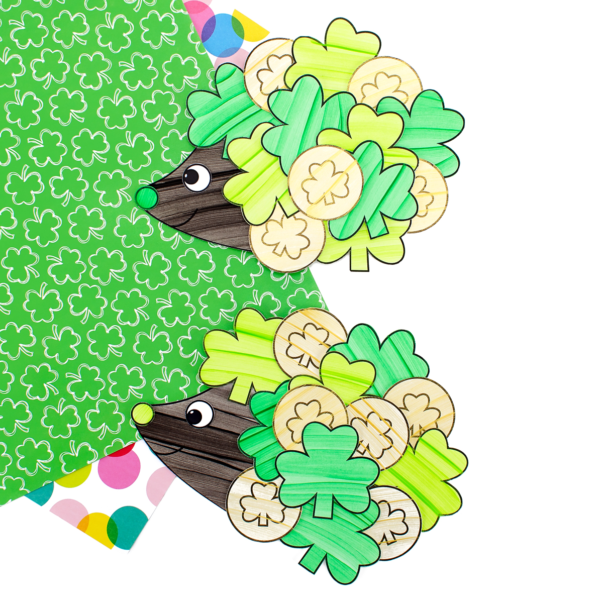 Two finished Shamrock Hedgehogs on a craft table. 