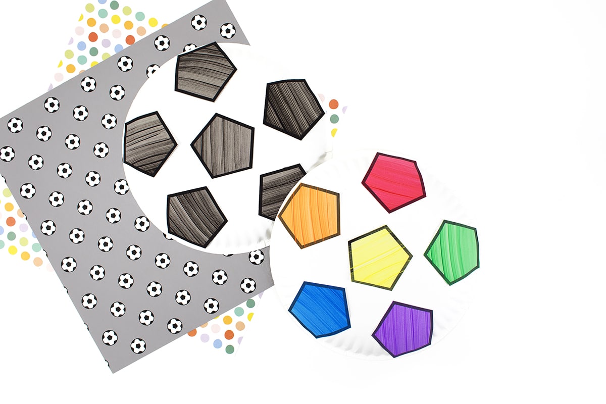 Two paper plate soccer ball crafts.