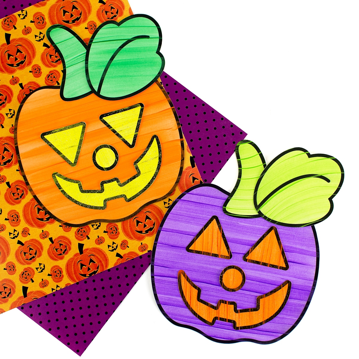 Orange and purple jack-o'-lantern crafts.