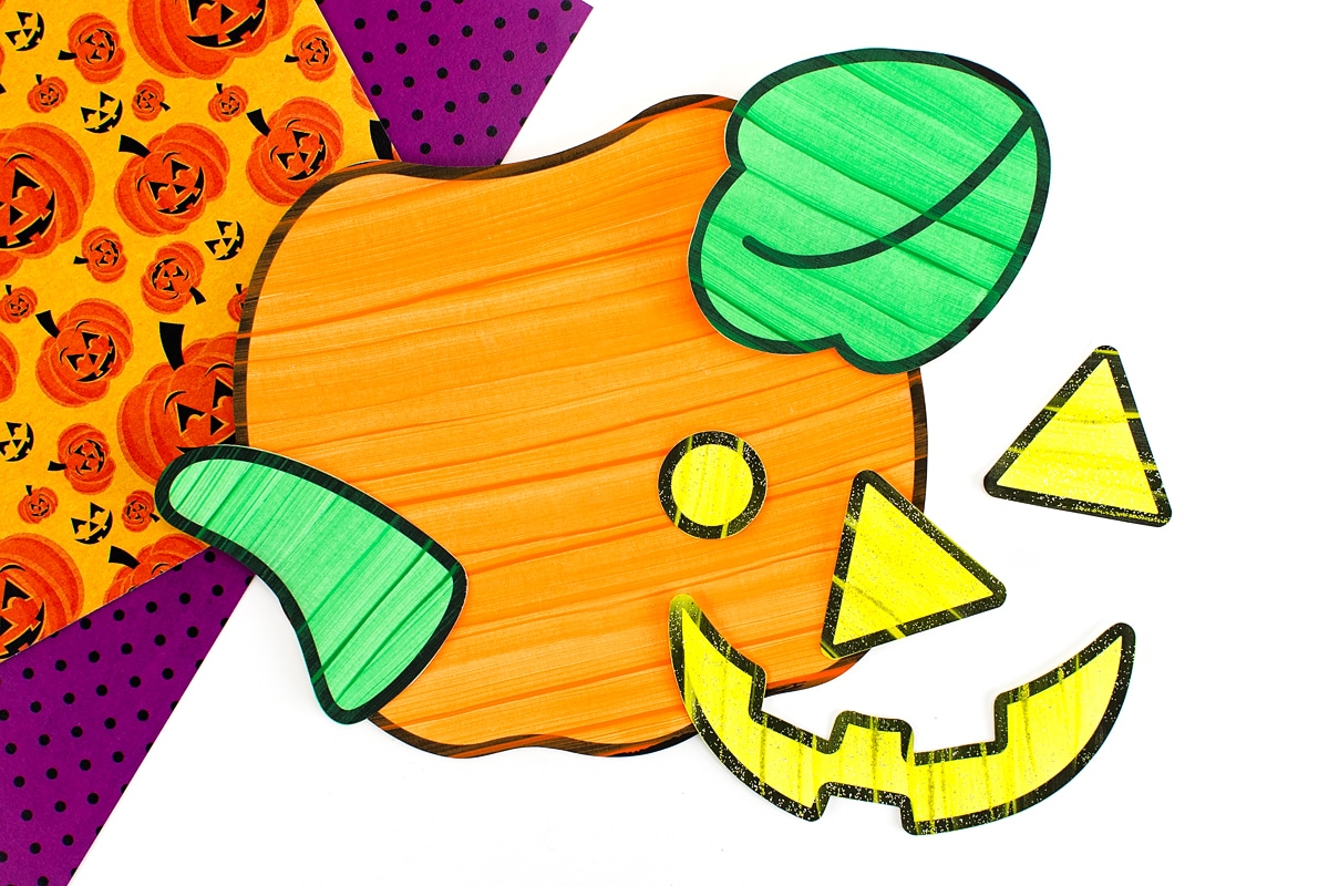 Paper Jack-O'-Lantern craft in process.