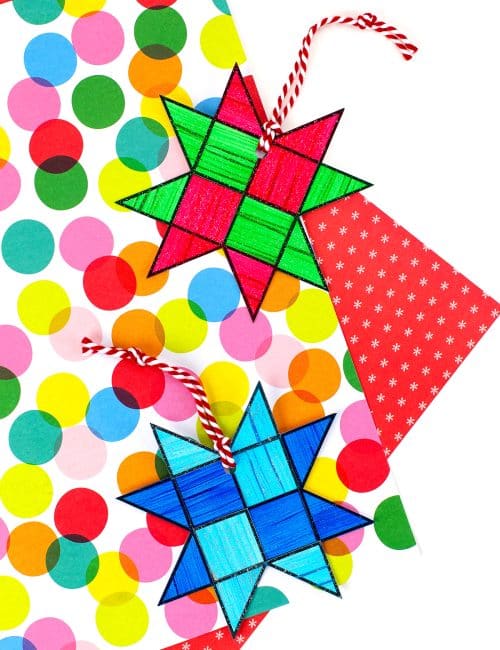 Two paper star ornaments for kids.