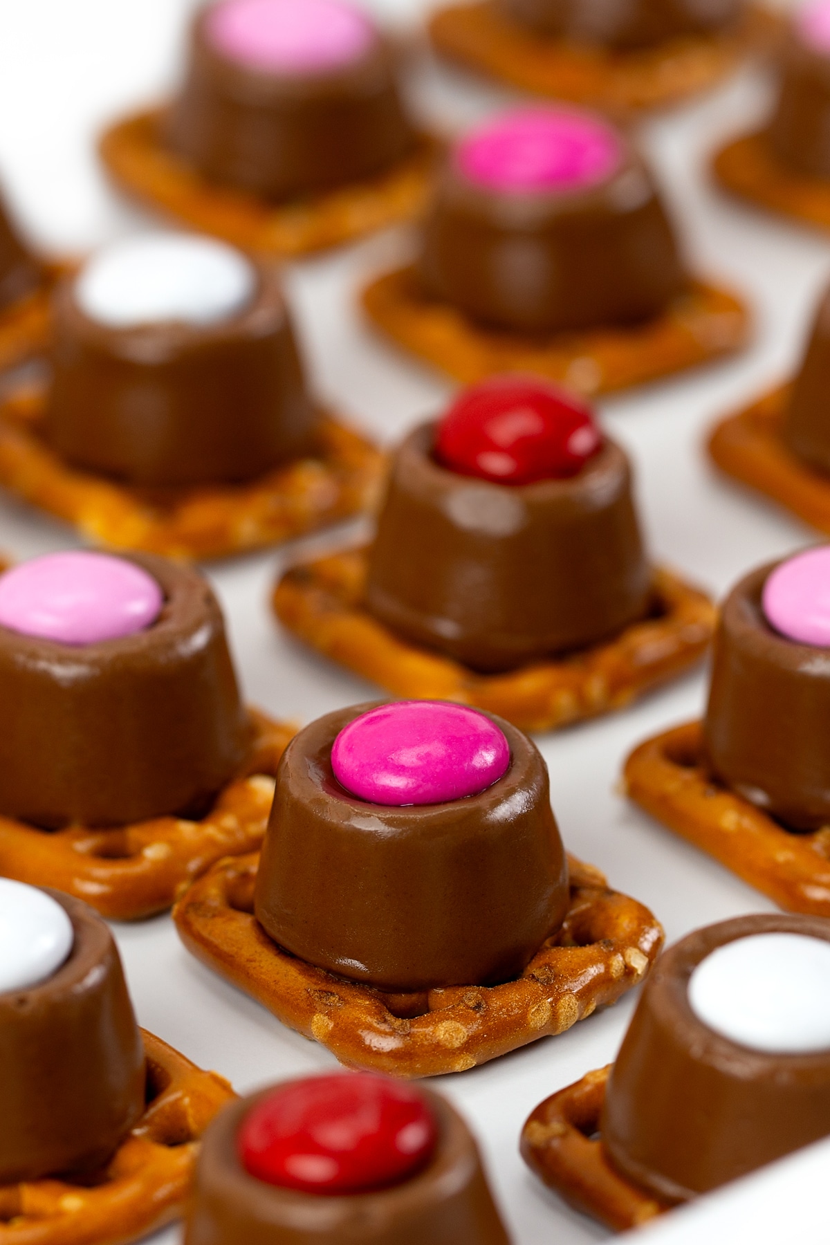 Rolo Pretzels lined up on a pan.