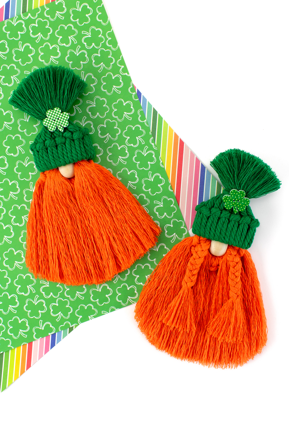 Macrame gnomes on St. Patrick's Day paper.