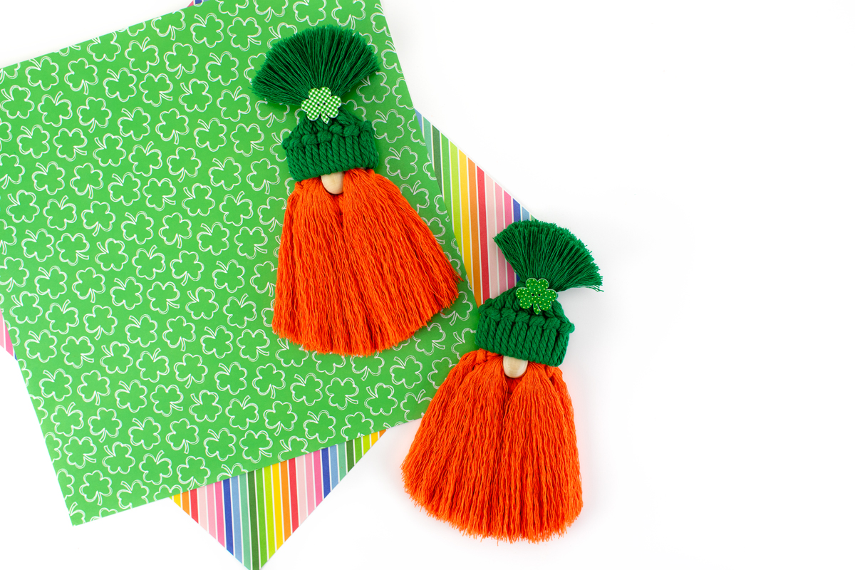 Two macrame gnomes on St. Paddy's Day paper.