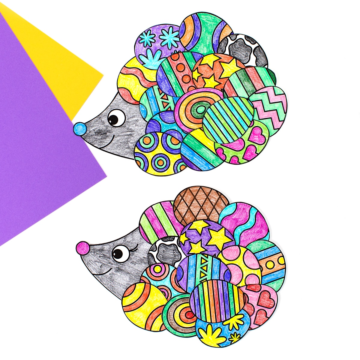 Easter Hedgehog Craft on purple and yellow paper.