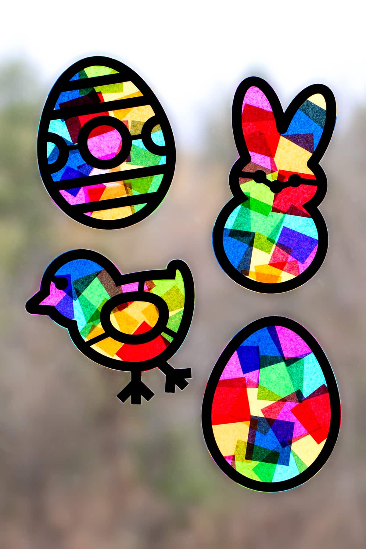 Easter suncatchers hanging in the window.