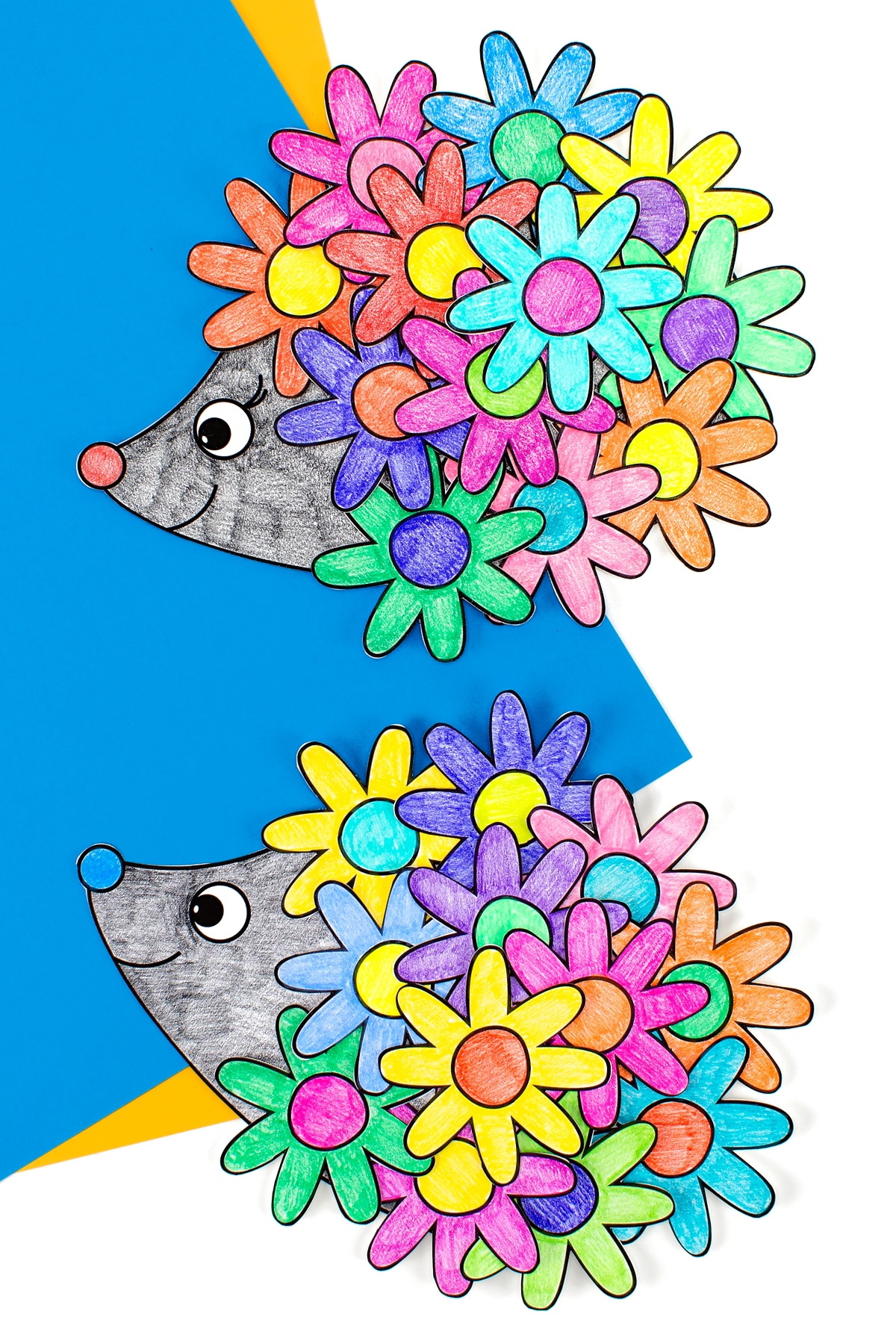 Two flower hedgehog cards on blue and yellow paper.
