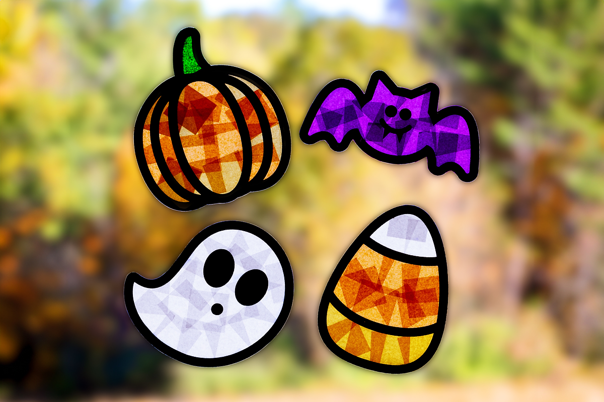 Four finished Halloween suncatchers.