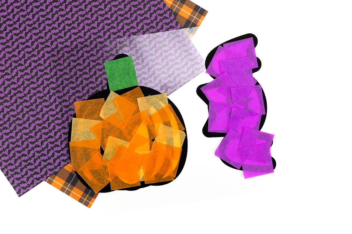 Pumpkin and bat suncatchers.