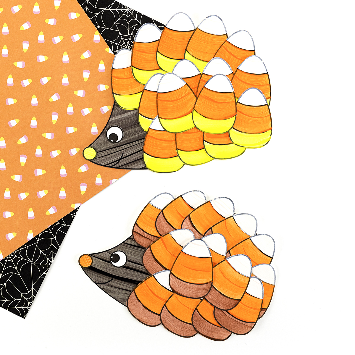 Two Halloween Hedgehog crafts with candy corn for spines.