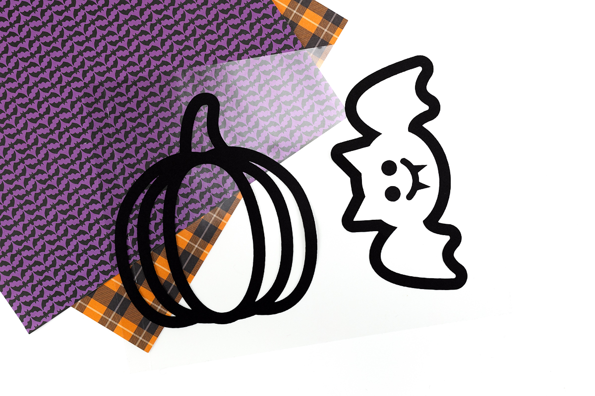 Two Halloween Suncatcher patterns on contact paper.