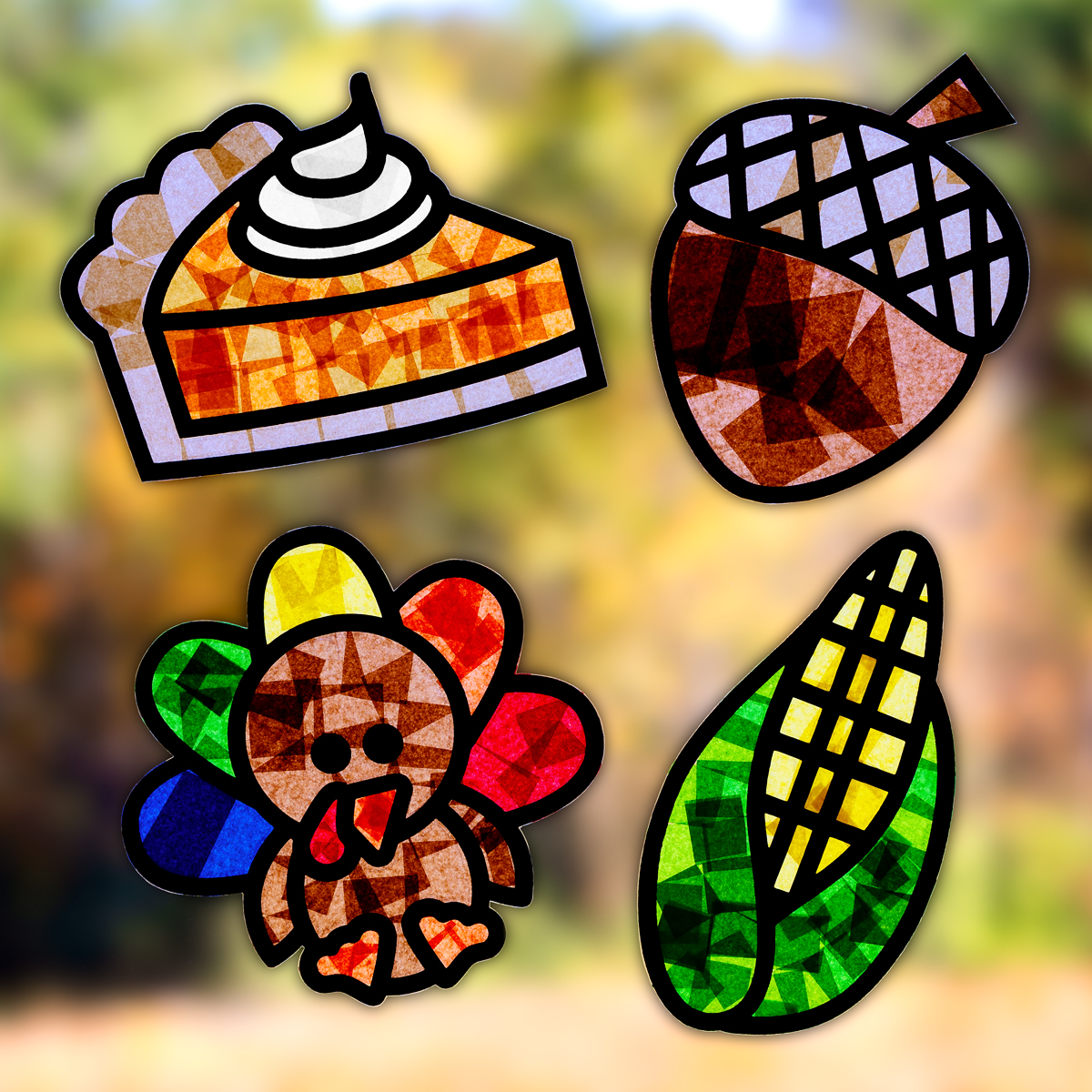 Pumpkin pie, corn, turkey, and corn suncatchers hanging on a window.