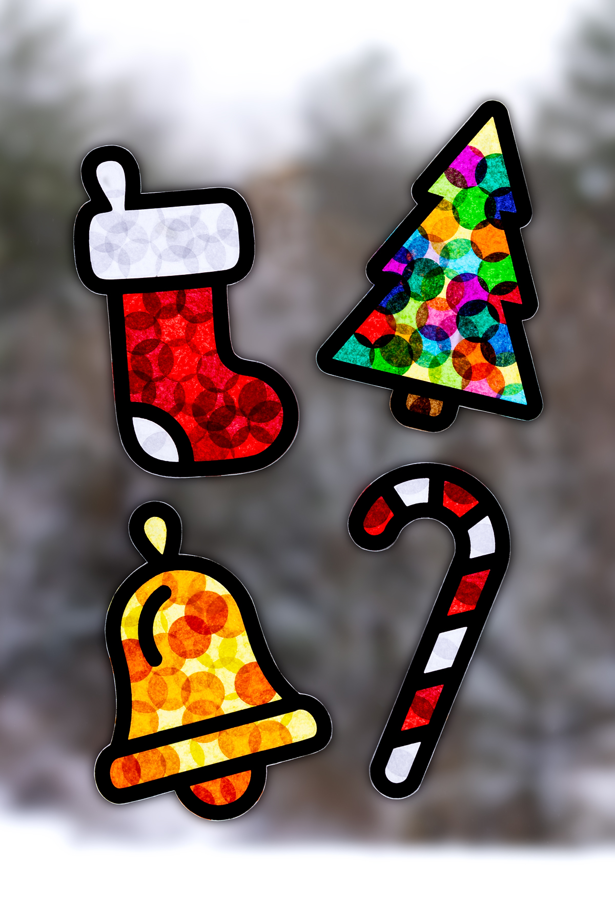 Stocking Suncatcher, Christmas Tree Suncatcher, Bell Suncatcher, and Candy Cane Suncatcher.