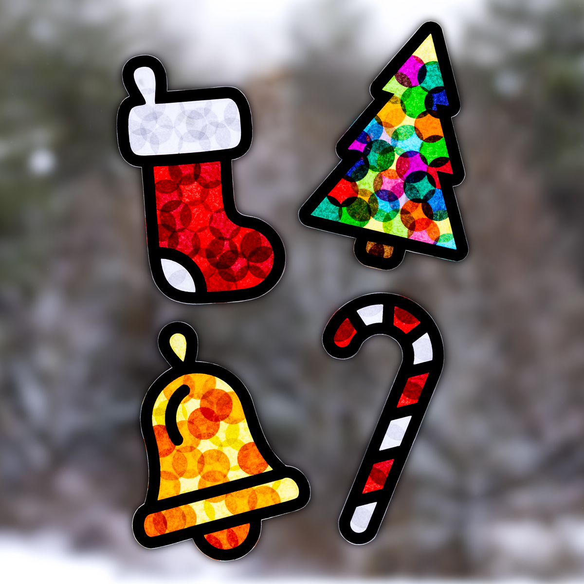 Stocking, Christmas tree, bell, and candy cane suncatchers.