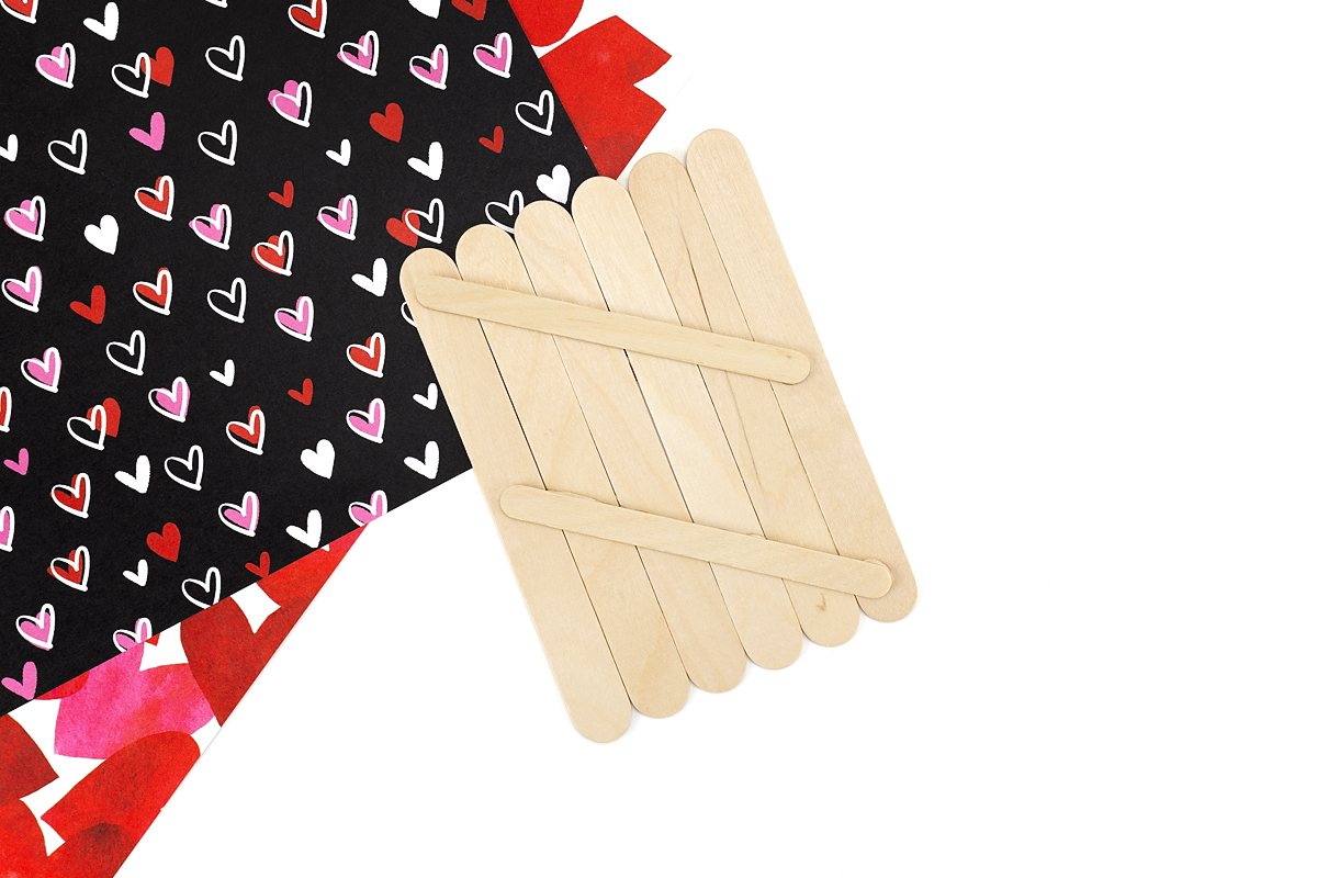 Wide popsicle sticks glued together to create the base for the craft.