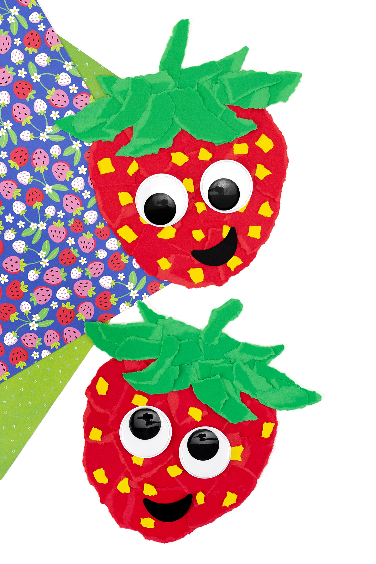 Two finished Paper Strawberries.