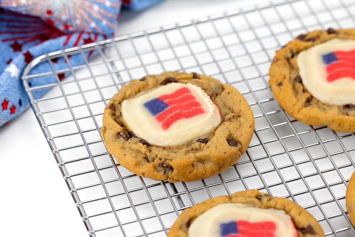 Patriotic cookies on a cooling rack.