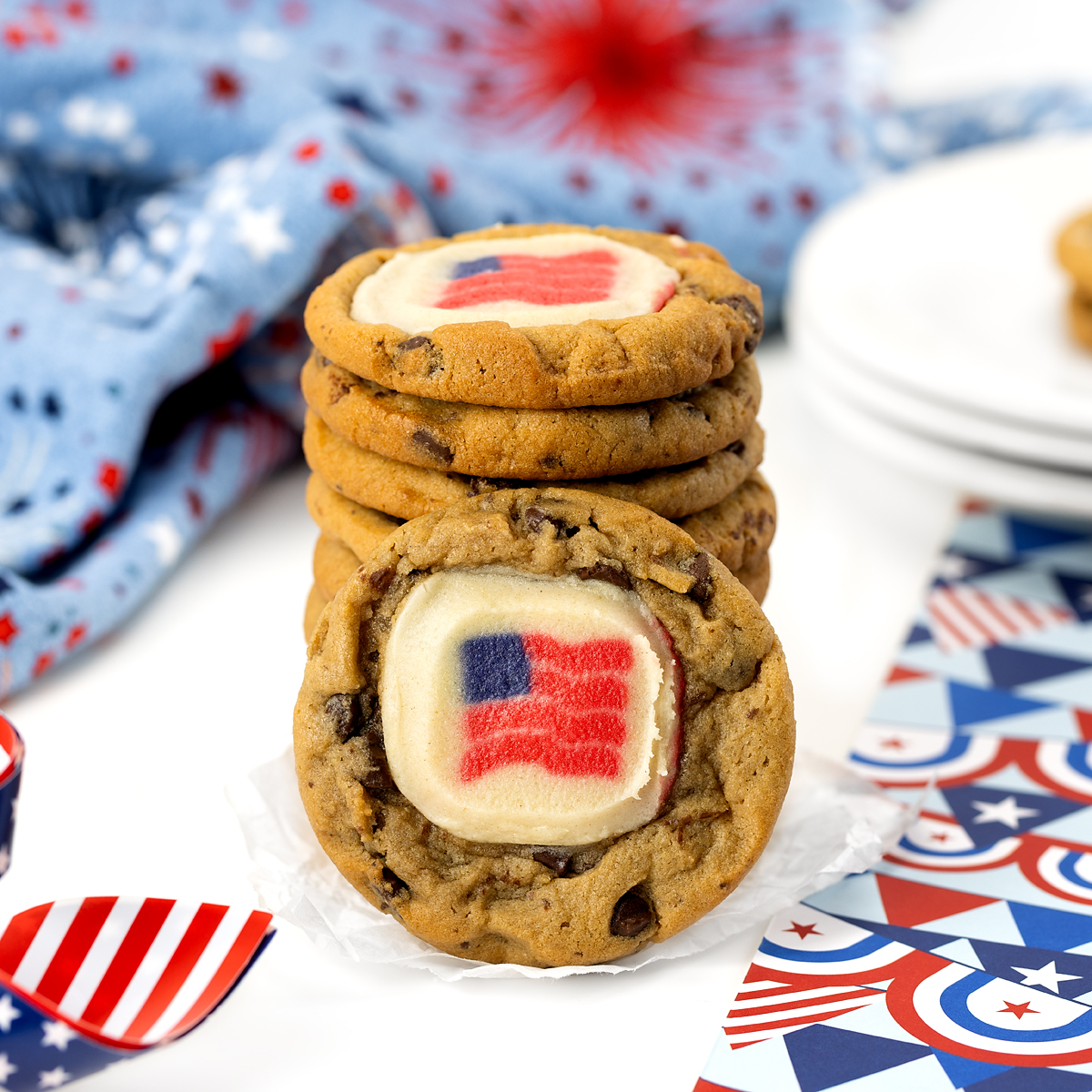Stack of Patriotic Cookies with red, white, and blue props.