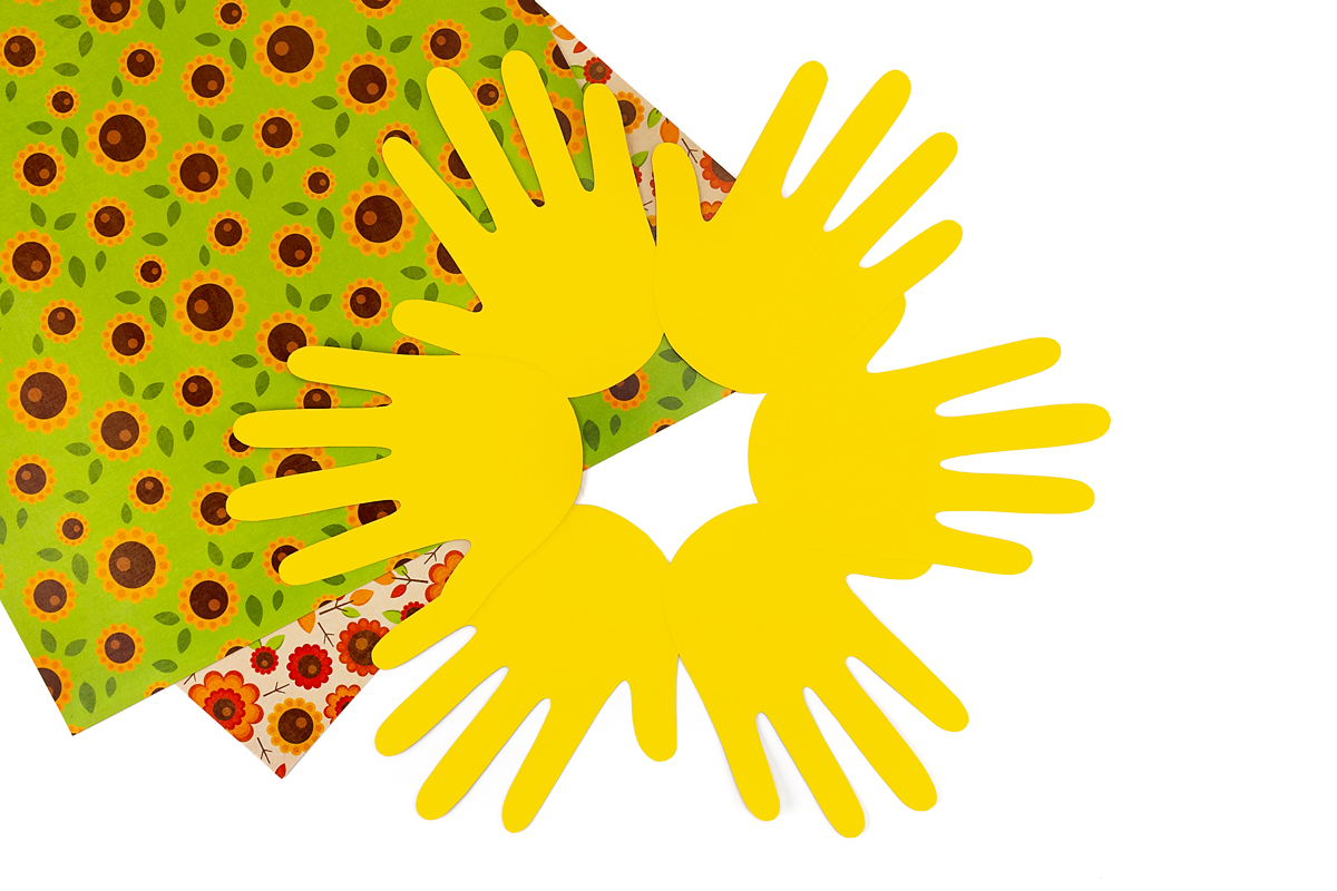 Handprint petals for Sumer sunflower craft.
