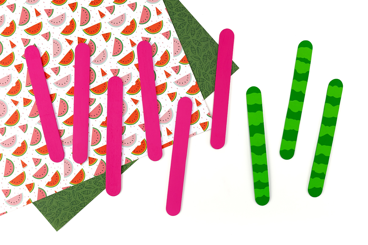 Popsicle sticks painted like watermelon.