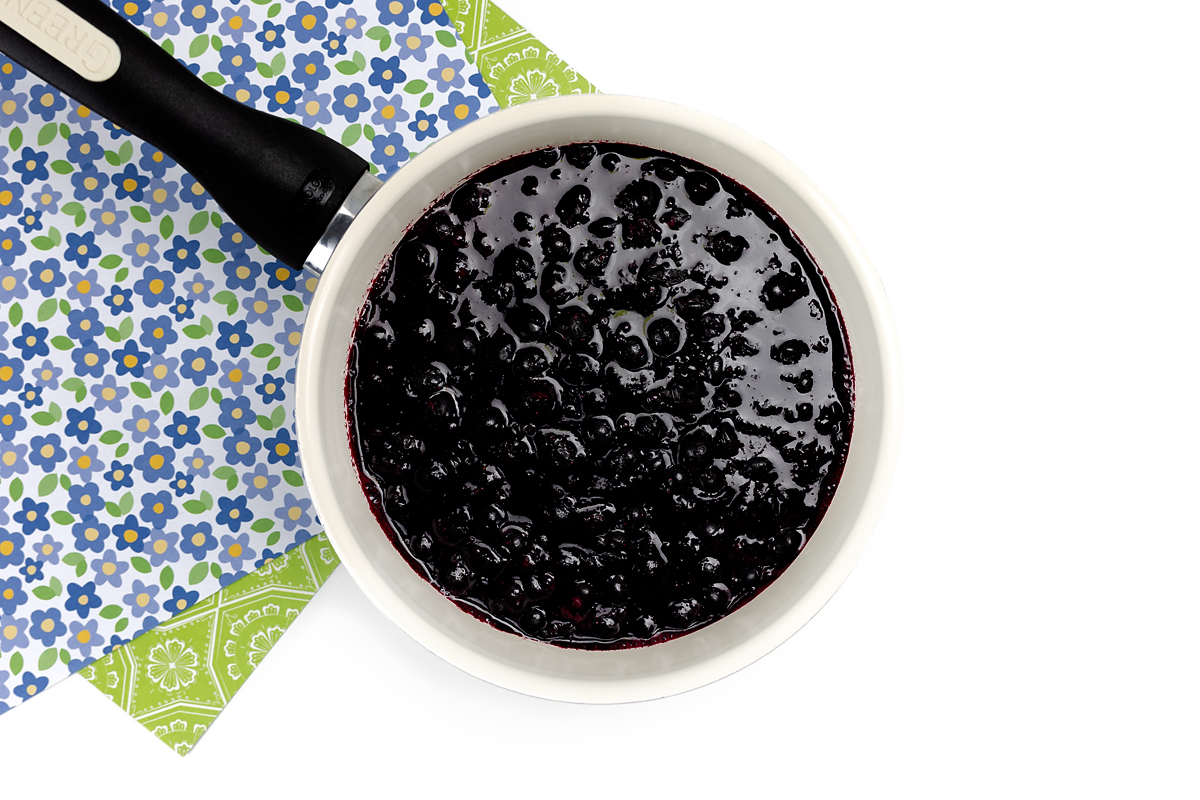 Cooked blueberries in a pot.