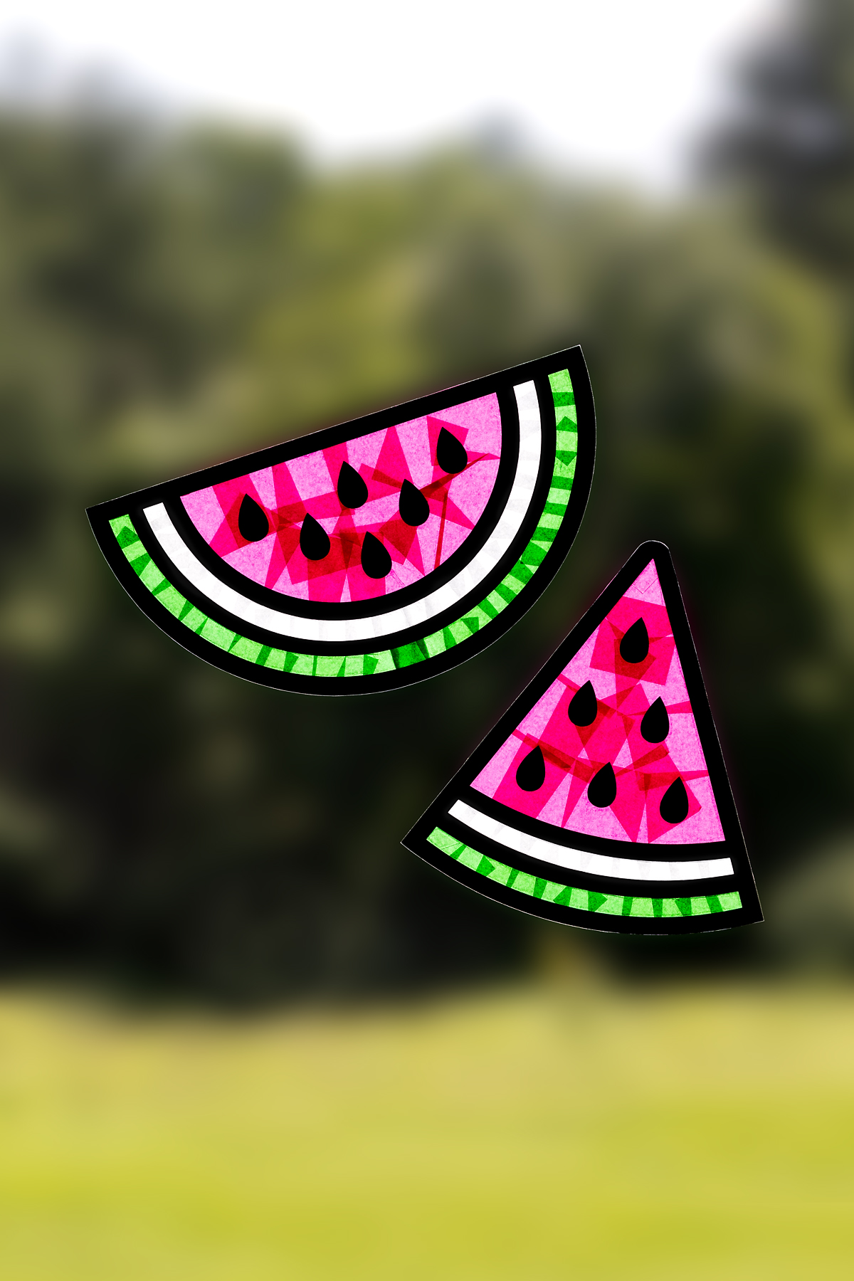 Watermelon suncatchers on a window.