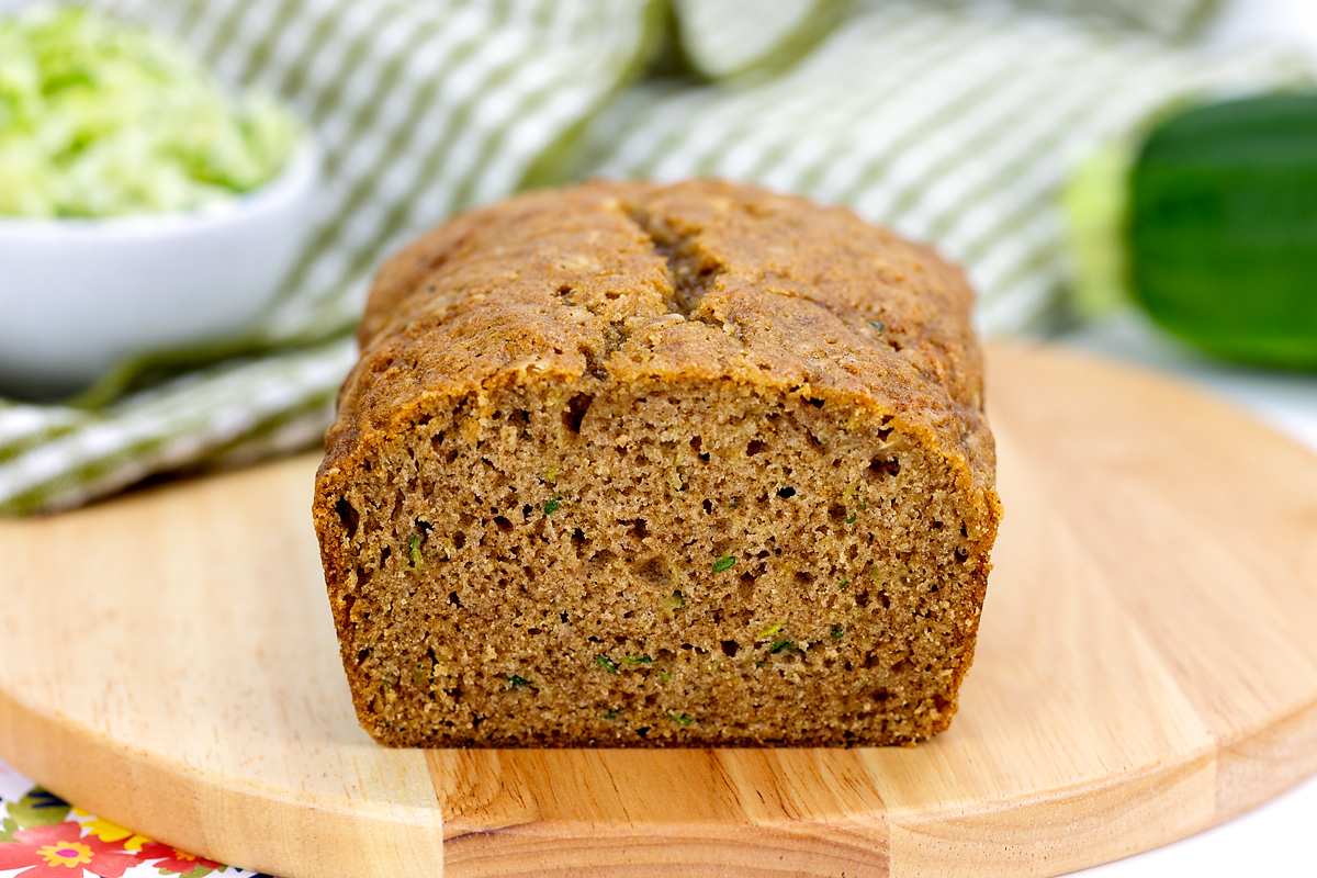 Loaf of zucchini bread cut in half.