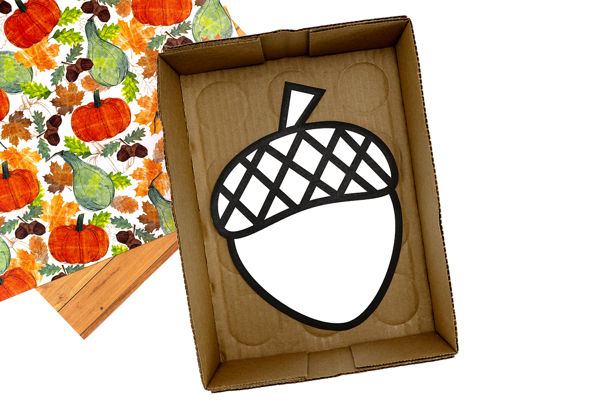Free printable acorn template in a box.