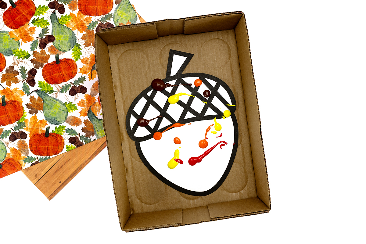 Free printable acorn template with paint on it.
