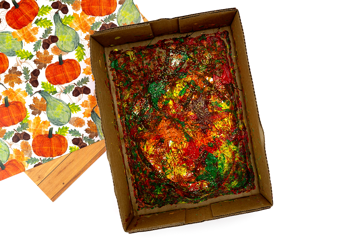 Acorn painting with glitter.