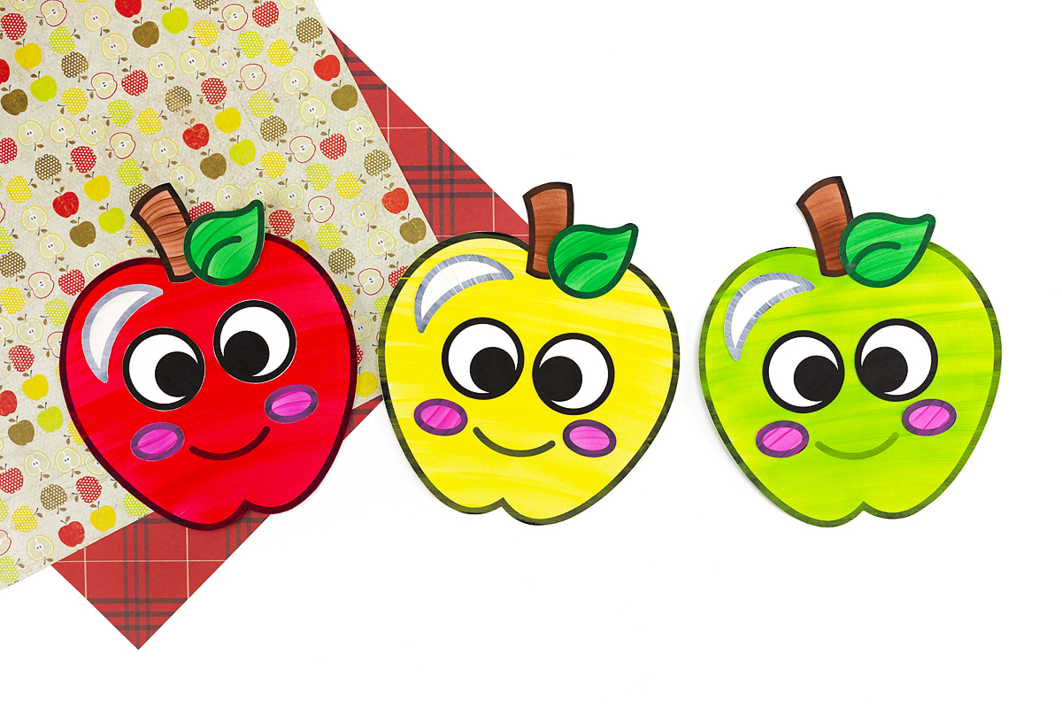 Red, yellow, and green apple crafts.