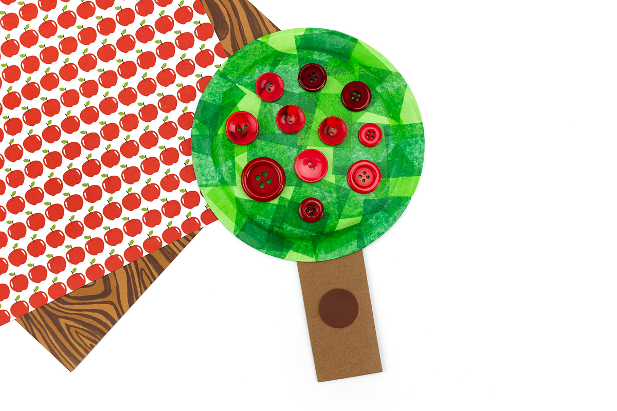Finished paper plate apple tree craft.