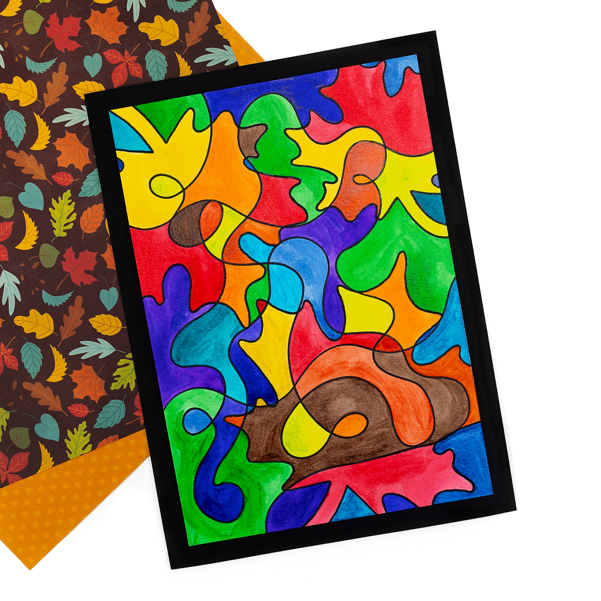 Finished fall leaf scribble art mounted on black paper.
