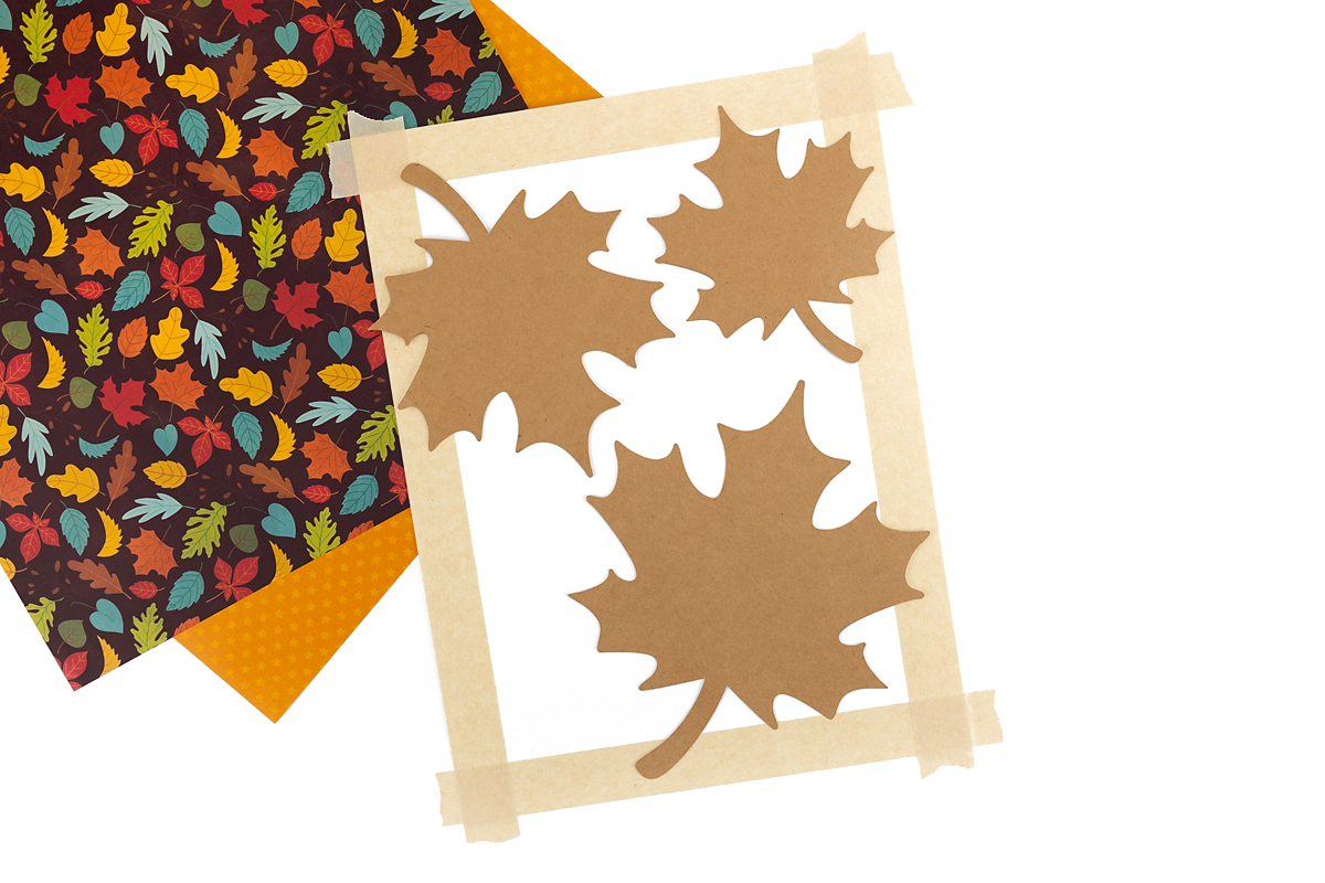 Leaf patterns on white paper.