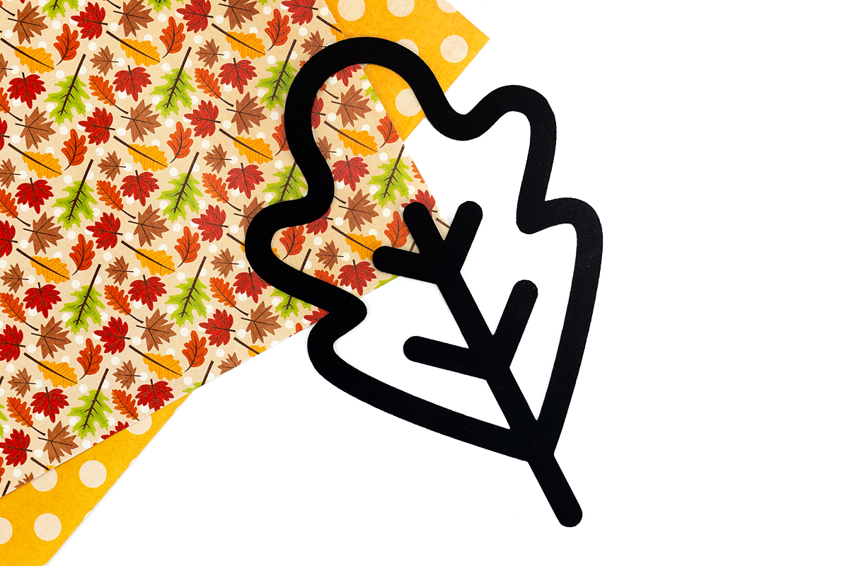 Fall leaf suncatcher template cut out.