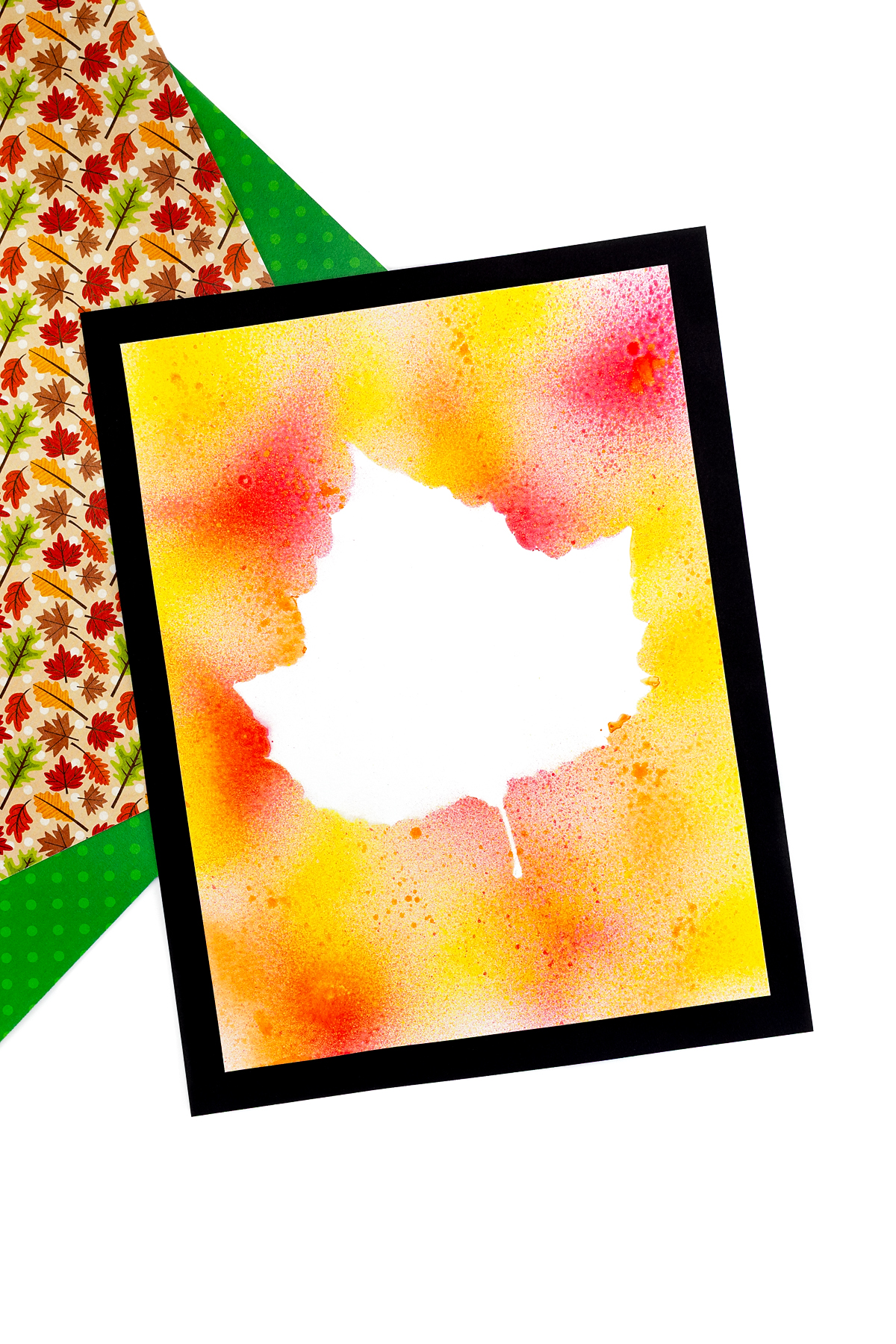 Beautiful Leaf Spray Painting mounted on black cardstock.