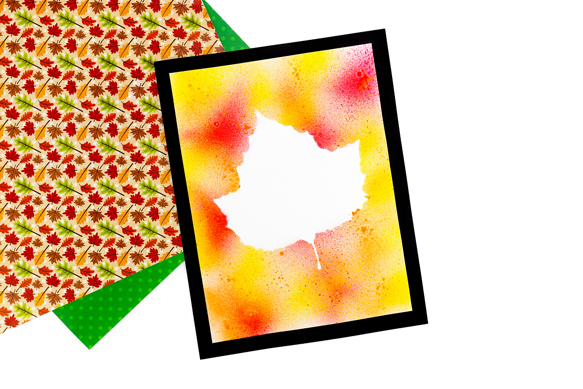 Leaf Spray Painting mounted on black cardstock.