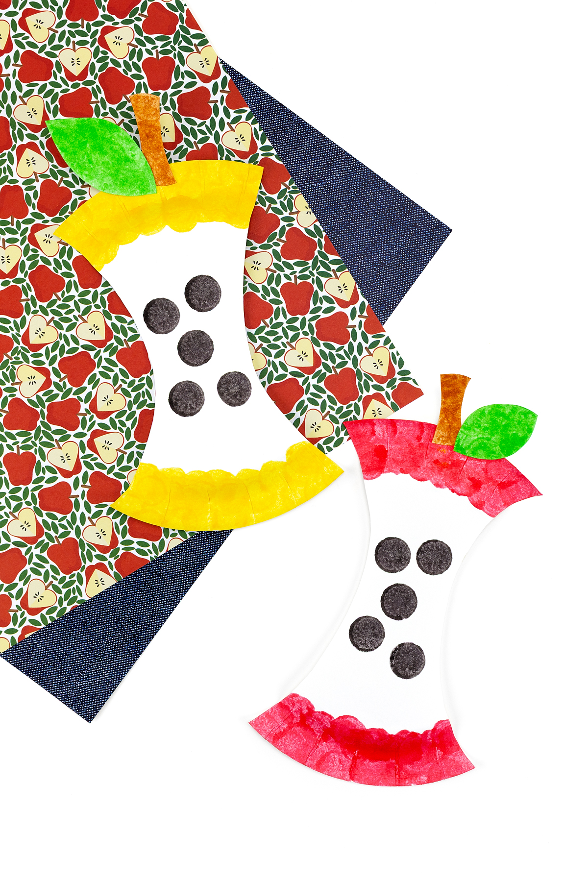 Yellow and red paper plate apple cores.