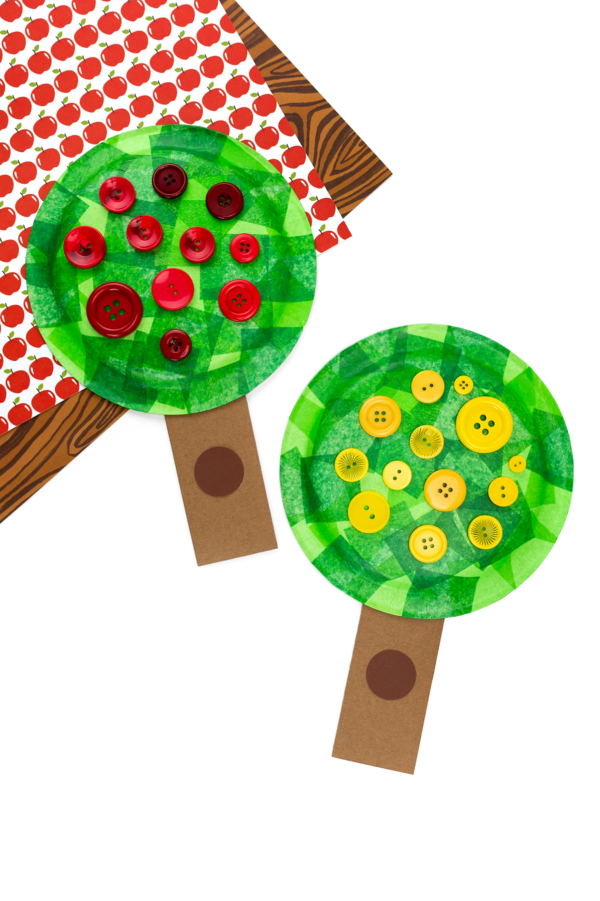 Red and yellow paper plate apple tree craft.
